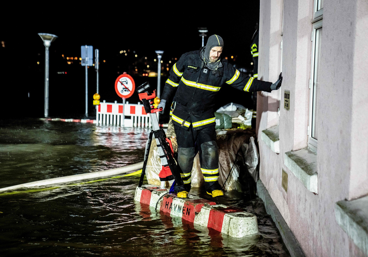 A firefighter works on a street in Sønderborg, southern Denmark.  Photo by Agence France-Presse