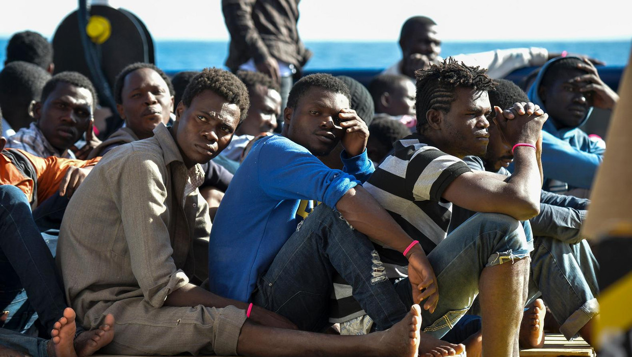 Migranten bij de kust van Libië. Beeld afp